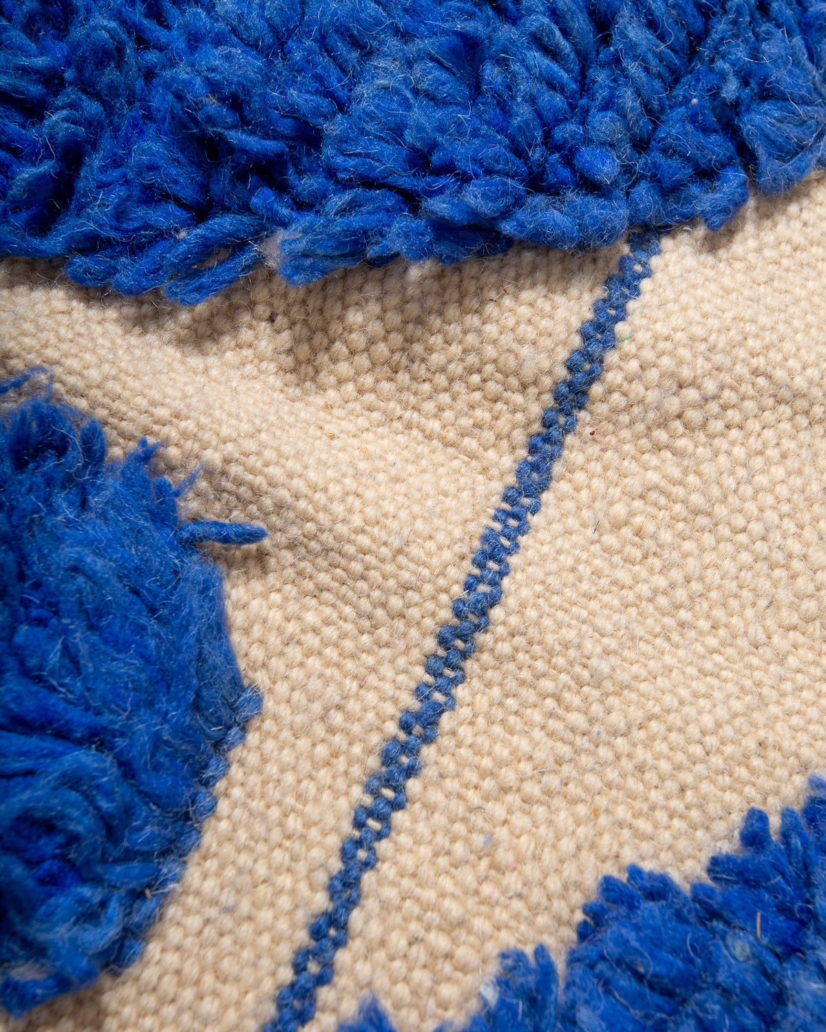 Modern, designer, handcrafted Berber rug from Morocco. Beniourain carpet with beautiful colours and patterns and fluffy wool texture.